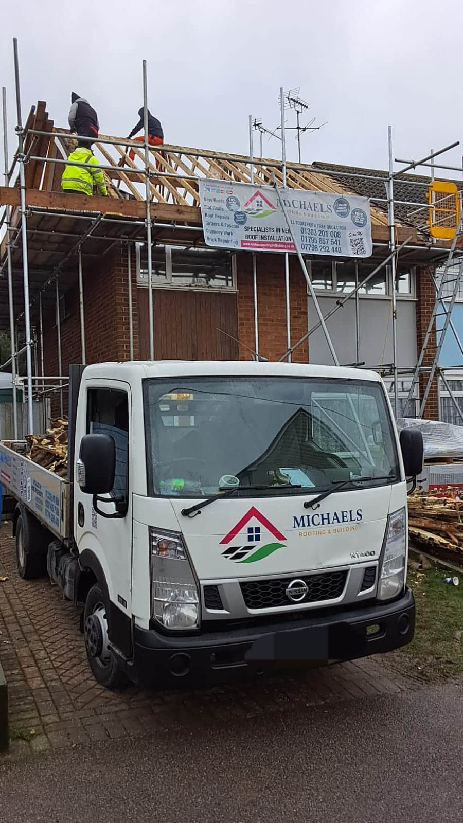 michaels roofing and building team